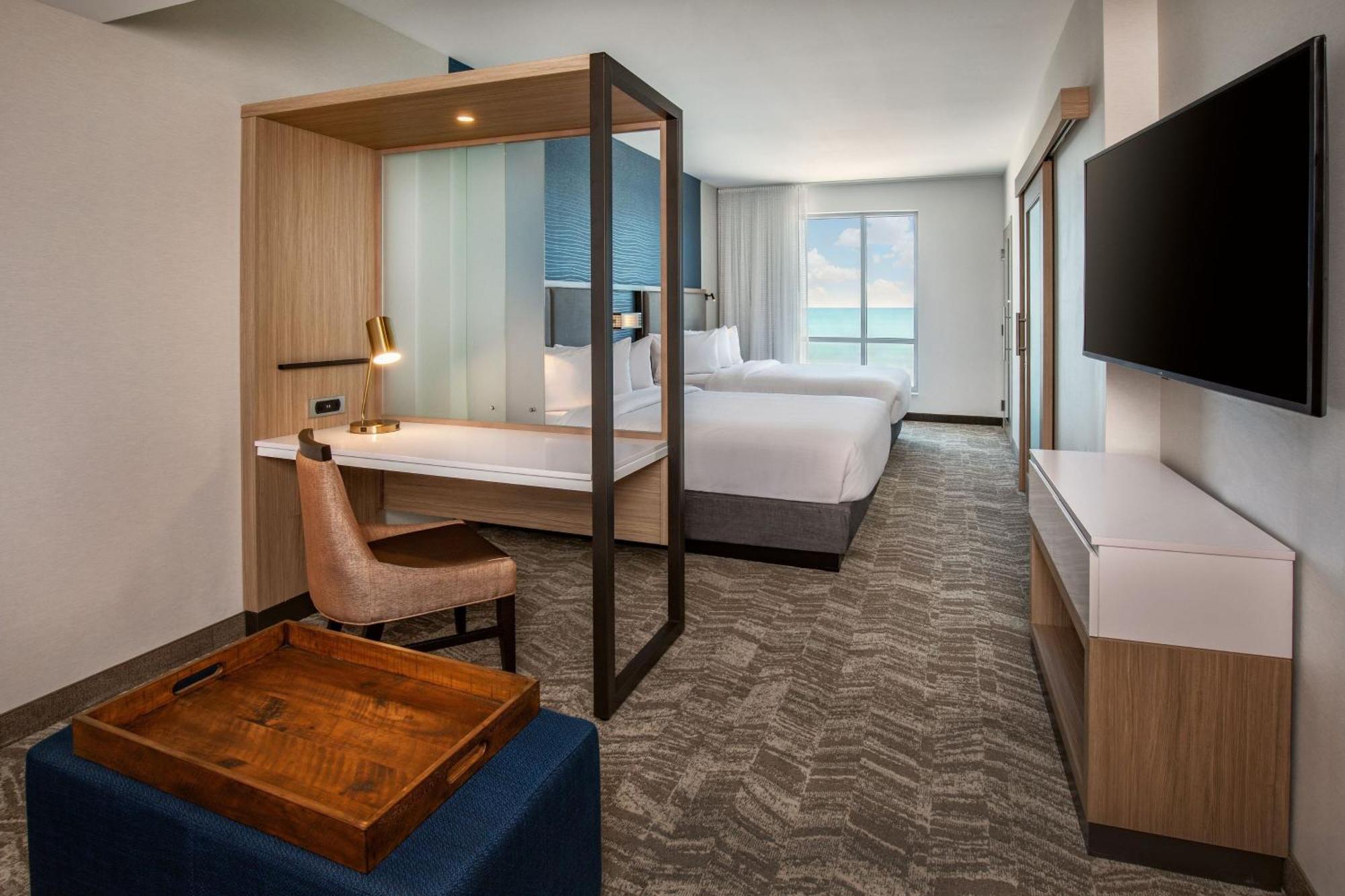 Queen Suite with Two Queen Beds, Partial Ocean View, Roll-In Shower and Sofa Bed - Mobility Access
