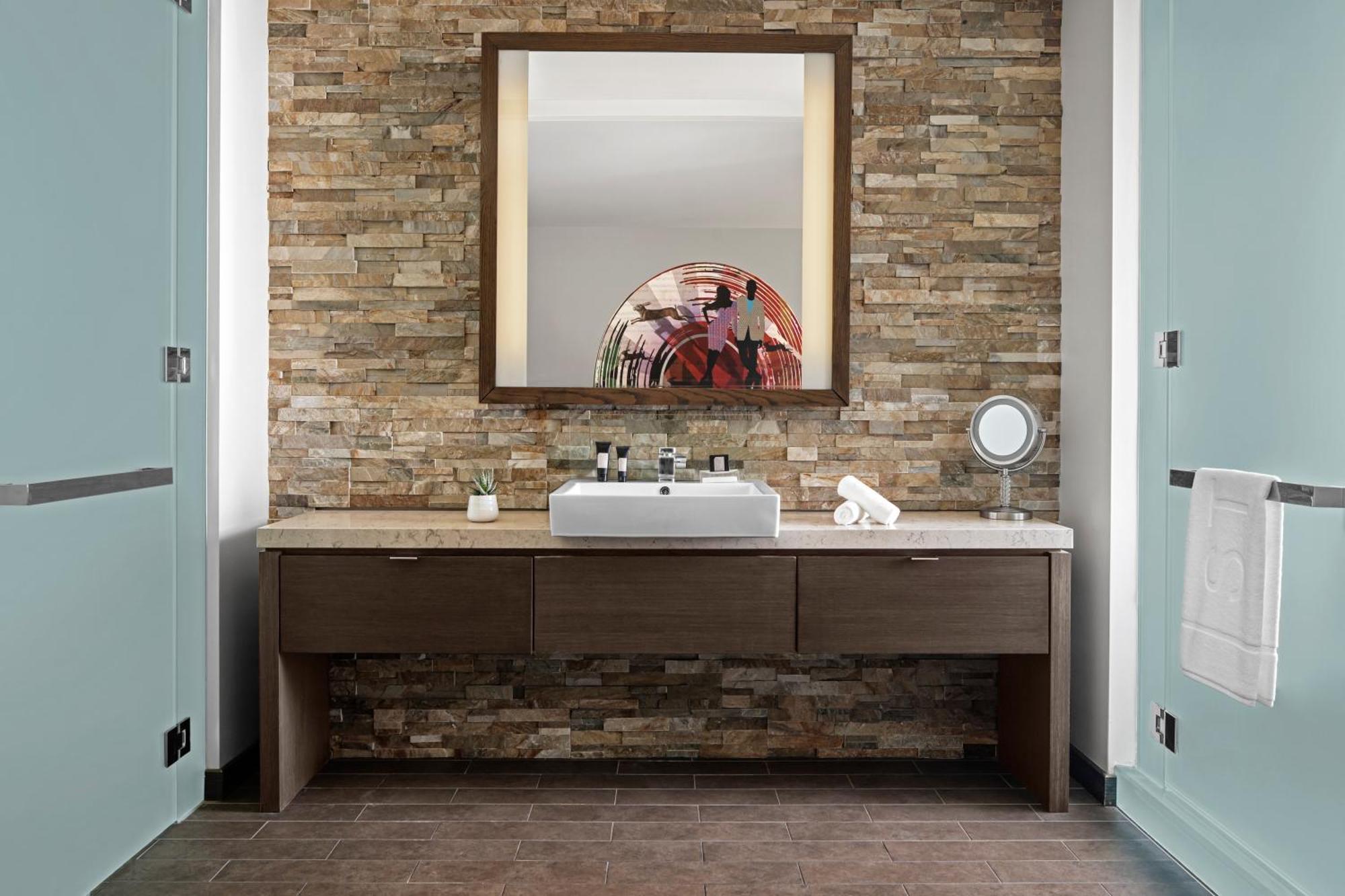 Premier King Suite with Balcony and Wet Deck View - Roll-In Shower/Mobility and Hearing Accessible