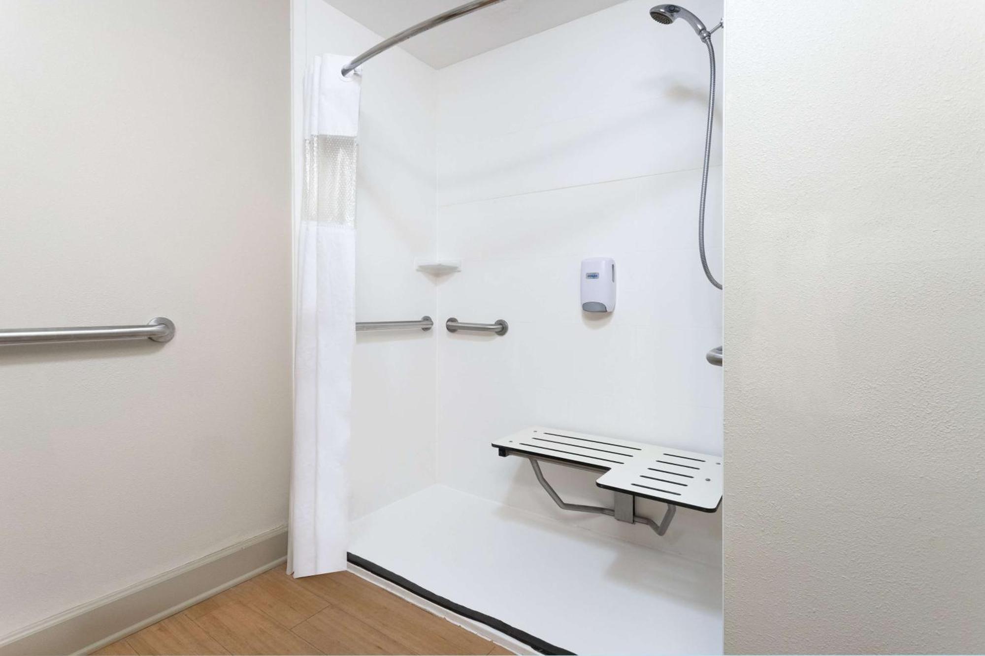 King Room One King Bed Roll Shower Grab Bars Mobility Accessible Non-Smoking,1619775389:JPEG
