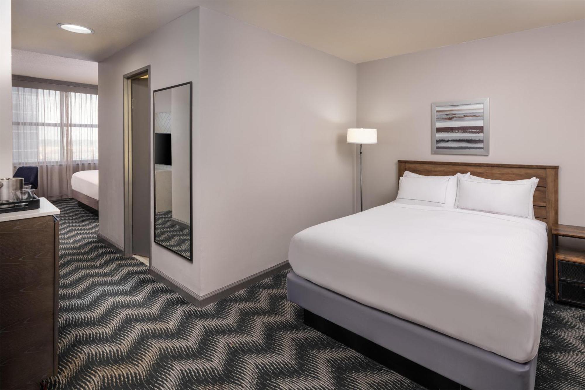 Studio Suite with One King Bed and One Queen Bed